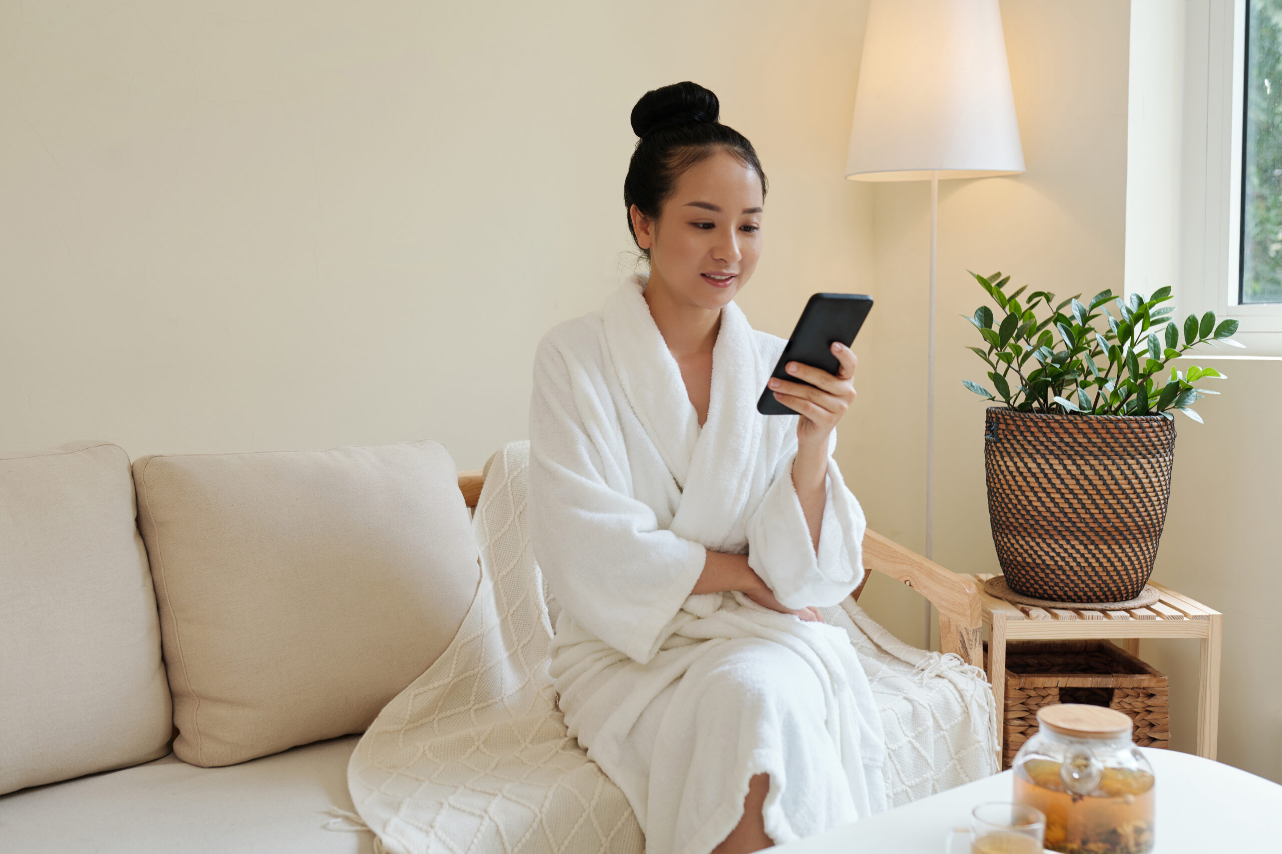 Spa Salon Client Checking Phone